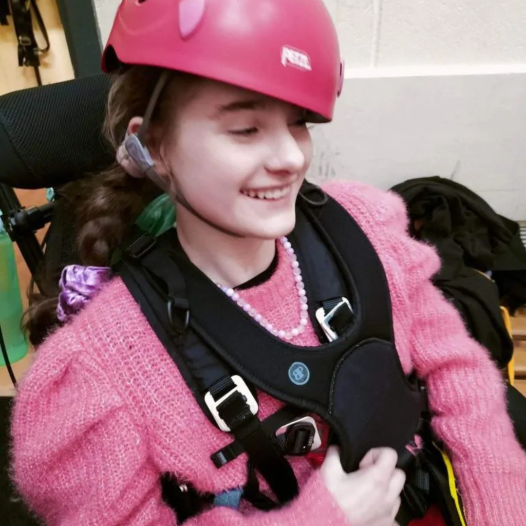 Ella seated in a Chunc specialist chair demonstrating supported posture in a real-life case study setting