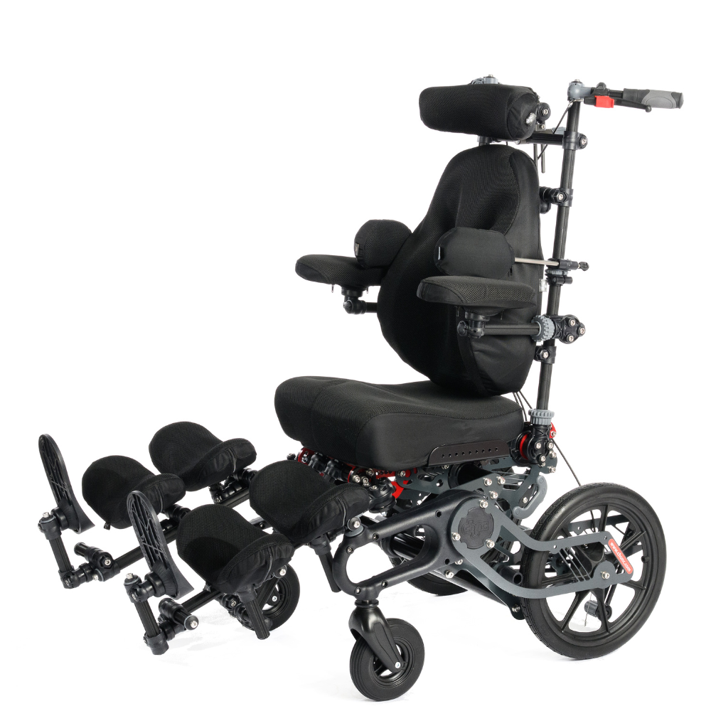 Spica paediatric postural chair with adjustable supports, available for short-term rental. Side angle view.