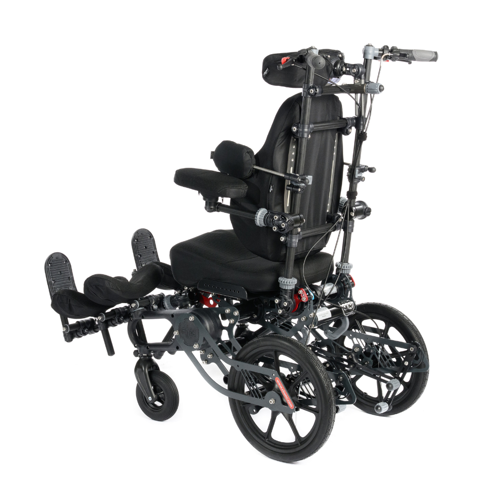 Spica paediatric postural chair with adjustable supports, available for short-term rental. Back angle view.