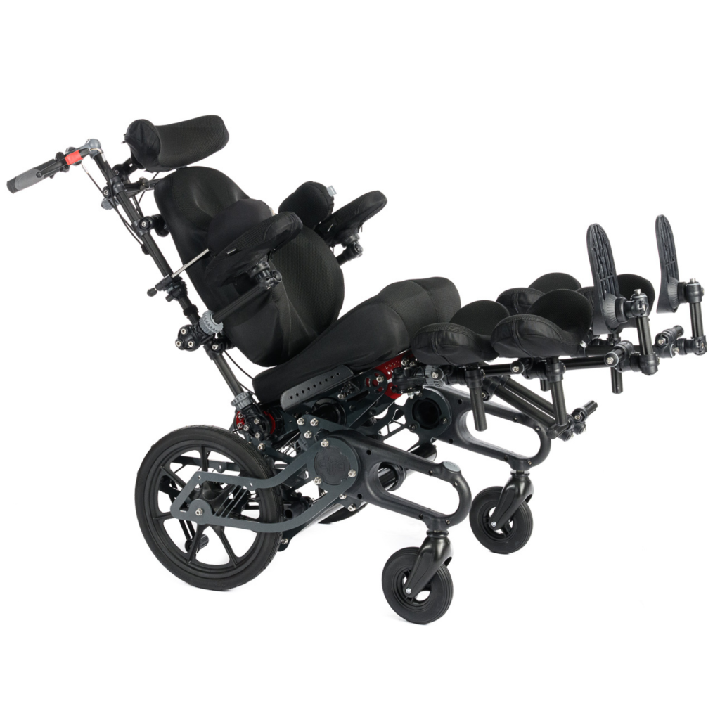 Spica paediatric postural chair with adjustable supports, available for short-term rental. Side view, showing the tilt in space feature.